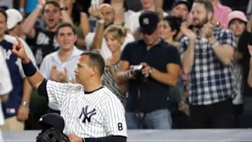 Aug 12, 2016; Bronx, NY, USA; New York Yankees designated hitter Alex Rodriguez (13) gestures to the crowd as he leaves the field during the ninth inning against the Tampa Bay Rays at Yankee Stadium. New York Yankees won 6-3. Mandatory Credit: Anthony Gruppuso-USA TODAY Sports