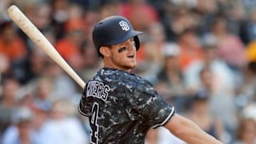 Sep 24, 2016; San Diego, CA, USA; San Diego Padres first baseman Wil Myers (4) hits the go ahead RBI single during the seventh inning of a 4-3 win over the San Francisco Giants at Petco Park. Mandatory Credit: Jake Roth-USA TODAY Sports