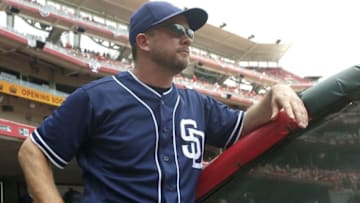 Jun 26, 2016; Cincinnati, OH, USA; San Diego Padres manager Andy Green watches from the dugout at the beginning of a game against the Cincinnati Reds at Great American Ball Park. Mandatory Credit: David Kohl-USA TODAY Sports