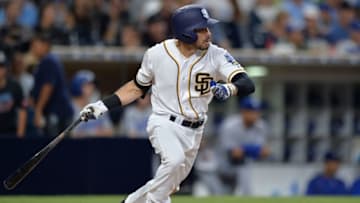 Sep 29, 2016; San Diego, CA, USA; San Diego Padres second baseman Carlos Asuaje (63) singles during the sixth inning against the Los Angeles Dodgers at Petco Park. Mandatory Credit: Jake Roth-USA TODAY Sports