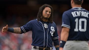 PHILADELPHIA, PA - JULY 22: Freddy Galvis #13 of the San Diego Padres celebrates with Hunter Renfroe #10 after the end of the top of the first inning against the Philadelphia Phillies at Citizens Bank Park on July 22, 2018 in Philadelphia, Pennsylvania. (Photo by Mitchell Leff/Getty Images)
