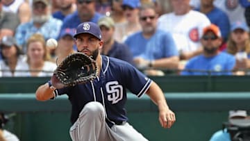 CHICAGO, IL - AUGUST 05: Eric Hosmer #30 of the San Diego Padres takes a throw at first base against the Chicago Cubs at Wrigley Field on August 5, 2018 in Chicago, Illinois. The Padres defeated the Cubs 10-6. (Photo by Jonathan Daniel/Getty Images)