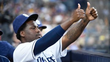 SAN DIEGO, CA - AUGUST 18: Franmil Reyes #32 of the San Diego Padres celebrates after a run scores during the fifth inning of a baseball game against the Arizona Diamondbacks at PETCO Park on August 18, 2018 in San Diego, California. (Photo by Denis Poroy/Getty Images)