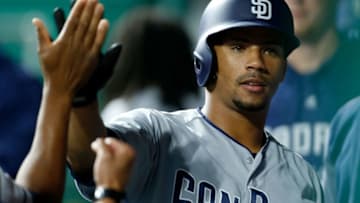 CINCINNATI, OH - SEPTEMBER 7: Francisco Mejia #27 of the San Diego Padres is congratulated by his teammates after scoring a run during the first inning of the game against the Cincinnati Reds at Great American Ball Park on September 7, 2018 in Cincinnati, Ohio. (Photo by Kirk Irwin/Getty Images)