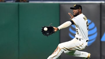 PITTSBURGH, PA - SEPTEMBER 18: Starling Marte #6 of the Pittsburgh Pirates makes a diving catch on a ball hit by Meibrys Viloria #72 of the Kansas City Royals (not pictured) during the tenth inning at PNC Park on September 18, 2018 in Pittsburgh, Pennsylvania. (Photo by Joe Sargent/Getty Images)