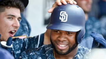 SAN DIEGO, CA - SEPTEMBER 30: Manuel Margot #7 of the San Diego Padres, right, is congratulated by Luis Urias #9 after hitting a solo home run during the second inning of a baseball game against the Arizona Diamondbacks at PETCO Park on September 30, 2018 in San Diego, California. (Photo by Denis Poroy/Getty Images)