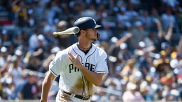 SAN DIEGO, CA - MARCH 28: Wil Myers #4 of the San Diego Padres hits a solo home run during the third inning on Opening Day against the San Francisco Giants at Petco Park March 28, 2019 in San Diego, California. (Photo by Denis Poroy/Getty Images)