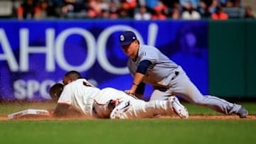 SAN FRANCISCO, CALIFORNIA - APRIL 10: Pablo Sandoval #48 of the San Francisco Giants slides into second for a double before the tag by Luis Urias #9 of the San Diego Padres during the eighth inning at Oracle Park on April 10, 2019 in San Francisco, California. (Photo by Daniel Shirey/Getty Images)