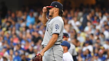 LOS ANGELES, CA - JULY 04: Dinelson Lamet #29 of the San Diego Padres adjusts his cap after walking the bases loaded in the fifth inning of the game against the Los Angeles Dodgers at Dodger Stadium on July 4, 2019 in Los Angeles, California. (Photo by Jayne Kamin-Oncea/Getty Images)