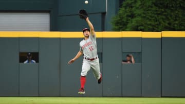 ATLANTA, GEORGIA - AUGUST 03: Nick Senzel #15 of the Cincinnati Reds fields a ball against the Atlanta Braves at SunTrust Park on August 03, 2019 in Atlanta, Georgia. (Photo by Logan Riely/Getty Images)