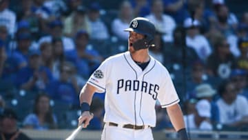 SAN DIEGO, CA - SEPTEMBER 12: Wil Myers #4 of the San Diego Padres argues a call before being ejected from the game during the ninth inning of a baseball game against Chicago Cubs at Petco Park September 12, 2019 in San Diego, California. (Photo by Denis Poroy/Getty Images)