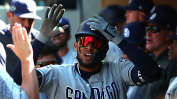 SEATTLE, WASHINGTON - AUGUST 07: Fernando Tatis Jr. #23 of the San Diego Padres celebrates in the dugout after hitting a leadoff home run against the Seattle Mariners in the first inning during their game at T-Mobile Park on August 07, 2019 in Seattle, Washington. (Photo by Abbie Parr/Getty Images)