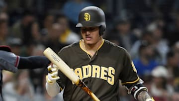 SAN DIEGO, CA - SEPTEMBER 20: Manny Machado #13 of the San Diego Padres tosses his bat after striking out during the the fourth inning of a baseball game against the Arizona Diamondbacks at Petco Park September 20, 2019 in San Diego, California. (Photo by Denis Poroy/Getty Images)