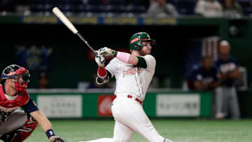 TOKYO, JAPAN - NOVEMBER 17: Infielder Esteban Quiroz #8 of Mexico grounds out in the bottom of 4th inning during the WBSC Premier 12 Bronze Medal final game between Mexico and USA at the Tokyo Dome on November 17, 2019 in Tokyo, Japan. (Photo by Kiyoshi Ota/Getty Images)