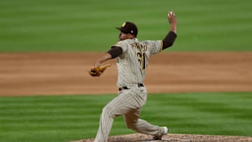 DENVER, COLORADO - AUGUST 01: Pitcher Luis Perdomo #61 of the San Diego Padres throws in the eighth inning against the Colorado Rockies at Coors Field on August 01, 2020 in Denver, Colorado. (Photo by Matthew Stockman/Getty Images)
