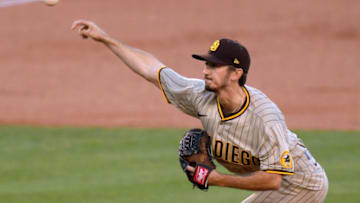 LOS ANGELES, CALIFORNIA - AUGUST 12: Zach Davies #17 of the San Diego Padres pitches against the Los Angeles Dodgers during the first inning at Dodger Stadium on August 12, 2020 in Los Angeles, California. (Photo by Harry How/Getty Images)