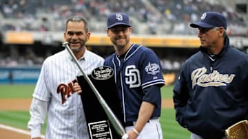 SAN DIEGO, CA - APRIL 13: Chase Headley #7 of the San Diego Padres poses with former Padres Benito Santiago after winning the Silver Slugger award as Bud Black #20 manager of the San Diego Padres looks on before a baseball game between the San Diego Padres and Colorado Rockies at Petco Park on April 13, 2013 in San Diego, California. (Photo by Denis Poroy/Getty Images)