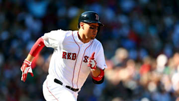 BOSTON, MA - SEPTEMBER 27: Allen Craig #5 of the Boston Red Sox runs to first base after a hit against the New York Yankees during a game at Fenway Park on September 27, 2014 in Boston, Massachusetts. (Photo by Elsa/Getty Images)