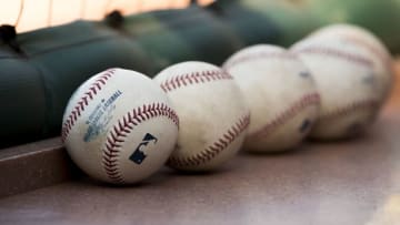 ST. LOUIS, MO - APRIL 25: Baseballs sit in the St. Louis Cardinals dugout prior to a game between the Pittsburgh Pirates and the St. Louis Cardinals at Busch Stadium on April 25, 2014 in St. Louis, Missouri. (Photo by David Welker/Getty Images)