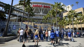 SAN DIEGO, CALIFORNIA - APRIL 04: Fans wait to get into PETCO Park on opening day before a baseball game between the San Diego Padres and the Los Angeles Dodgers on April 4, 2016 in San Diego, California. (Photo by Denis Poroy/Getty Images)