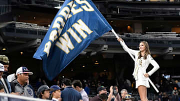 SAN DIEGO, CALIFORNIA - MAY 2: A member of the Pad Squad holds up a banner after the San Diego Padres beat the Colorado Rockies at PETCO Park on May 2, 2016 in San Diego, California. (Photo by Denis Poroy/Getty Images) *** Local Caption ***
