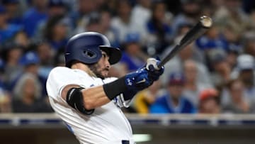 SAN DIEGO, CA - SEPTEMBER 2: Carlos Asuaje #20 of the San Diego Padres hits a solo home run during the fourth inning in game two of a doubleheader against the Los Angeles Dodgers at PETCO Park on September 2, 2017 in San Diego, California. (Photo by Denis Poroy/Getty Images)