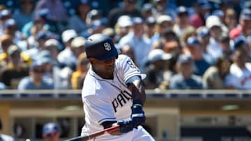 SAN DIEGO, CA - MARCH 29: Jose Pirela #2 of the San Diego Padres hits a single during the fourth inning on Opening Day against the Milwaukee Brewers at PETCO Park on March 29, 2018 in San Diego, California. (Photo by Denis Poroy/Getty Images)