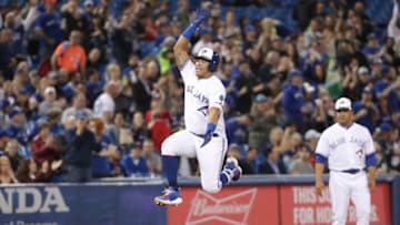 TORONTO, ON - APRIL 25: Yangervis Solarte #26 of the Toronto Blue Jays celebrates after hitting a solo home run in the sixth inning during MLB game action against the Boston Red Sox at Rogers Centre on April 25, 2018 in Toronto, Canada. (Photo by Tom Szczerbowski/Getty Images)