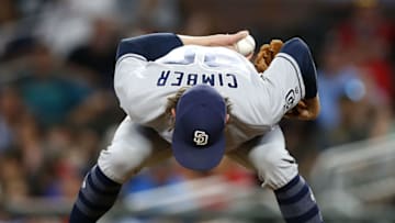 ATLANTA, GA - JUNE 14: Pitcher Adam Cimber #90 of the San Diego Padres gets in the stretch in the eighth inning during the game against the Atlanta Braves at SunTrust Park on June 14, 2018 in Atlanta, Georgia. (Photo by Mike Zarrilli/Getty Images)