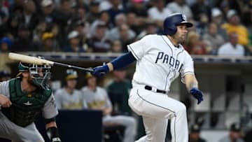 SAN DIEGO, CA - JUNE 19: Raffy Lopez #0 of the San Diego Padres hits an RBI single during the second inning of a baseball game against the Oakland Athletics at PETCO Park on June 19, 2018 in San Diego, California. (Photo by Denis Poroy/Getty Images)