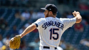 SAN DIEGO, CA - JUNE 20: Cory Spangenberg #15 of the San Diego Padres pitches during the ninth inning of a baseball game against the Oakland Athletics at PETCO Park on June 20, 2018 in San Diego, California. (Photo by Denis Poroy/Getty Images)