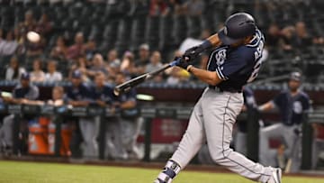 PHOENIX, AZ - JULY 05: Carlos Asuaje #20 of the San Diego Padres triples in the first inning of the MLB game against the Arizona Diamondbacks at Chase Field on July 5, 2018 in Phoenix, Arizona. (Photo by Jennifer Stewart/Getty Images)