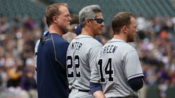 DENVER, CO - APRIL 10: (R-L) Manager Andy Green