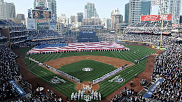SAN DIEGO, CA - APRIL 5 : U.S. Navy sailors roll out a huge American flag before the Padres home opener between the Los Angeles Dodgers and the San Diego Padres at Petco Park on April 5, 2012 in San Diego, California. (Photo by Denis Poroy/Getty Images)