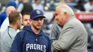 SAN DIEGO, CA - APRIL 3: San Diego Padres manager Andy Green talks with Ron Fowler, Executive Chairman of the San Diego Padres, before a baseball game against the Colorado Rockies at PETCO Park on April 3, 2018 in San Diego, California. (Photo by Denis Poroy/Getty Images)