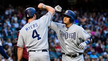 PHOENIX, ARIZONA - SEPTEMBER 28: Manny Machado #13 of the San Diego Padres celebrates a two run home run with teammate Wil Myers #4 in the third inning of the MLB game against the Arizona Diamondbacks at Chase Field on September 28, 2019 in Phoenix, Arizona. (Photo by Jennifer Stewart/Getty Images)