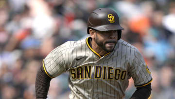 Tommy Pham of the San Diego Padres hits a two-run RBI double against the San Francisco Giants in the top of the fifth inning at Oracle Park on September 16, 2021 in San Francisco, California. (Photo by Thearon W. Henderson/Getty Images)