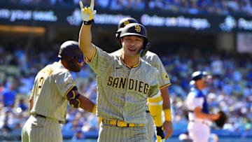 Jul 3, 2022; Los Angeles, California, USA; San Diego Padres shortstop Ha-Seong Kim (7) reacts after hitting a two run home run against the Los Angeles Dodgers during the ninth inning at Dodger Stadium. Mandatory Credit: Gary A. Vasquez-USA TODAY Sports