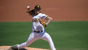 Sep 23, 2020; San Diego, California, USA; San Diego Padres starting pitcher Mike Clevinger (52) pitches during the first inning against the Los Angeles Angels at Petco Park. Mandatory Credit: Orlando Ramirez-USA TODAY Sports