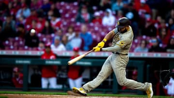San Diego Padres first baseman Eric Hosmer (30) hits a 2-run home run in the fourth inning of the MLB baseball game between Cincinnati Reds and San Diego Padres at Great American Ball Park in Cincinnati on Tuesday, April 26, 2022.San Diego Padres At Cincinnati Reds 58