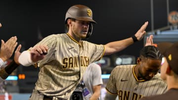 Oct 11, 2022; Los Angeles, California, USA; San Diego Padres right fielder Wil Myers (5) celebrates after hitting a home run during the fifth inning of game one of the NLDS for the 2022 MLB Playoffs against the Los Angeles Dodgers at Dodger Stadium. Mandatory Credit: Jayne Kamin-Oncea-USA TODAY Sports
