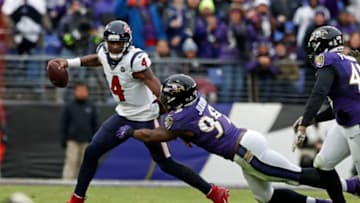 BALTIMORE, MARYLAND - NOVEMBER 17: Quarterback Deshaun Watson #4 of the Houston Texans is sacked by outside linebacker Matt Judon #99 of the Baltimore Ravens during the second half at M&T Bank Stadium on November 17, 2019 in Baltimore, Maryland. (Photo by Todd Olszewski/Getty Images)