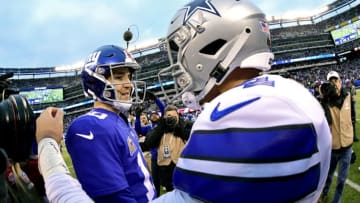 EAST RUTHERFORD, NEW JERSEY - DECEMBER 30: Eli Manning #10 of the New York Giants shakes with Dak Prescott #4 of the Dallas Cowboys after the Cowboys 36-35 win at MetLife Stadium on December 30, 2018 in East Rutherford, New Jersey. (Photo by Steven Ryan/Getty Images)