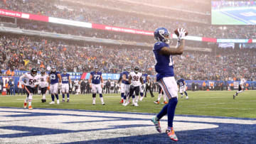 EAST RUTHERFORD, NEW JERSEY - DECEMBER 02: Odell Beckham #13 of the New York Giants scores a third quarter touchdown reception against the Chicago Bears at MetLife Stadium on December 02, 2018 in East Rutherford, New Jersey. (Photo by Al Bello/Getty Images)