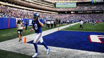 EAST RUTHERFORD, NEW JERSEY - SEPTEMBER 12: Daniel Jones #8 of the New York Giants runs off the field at halftime against the Denver Broncos at MetLife Stadium on September 12, 2021 in East Rutherford, New Jersey. (Photo by Tim Nwachukwu/Getty Images)