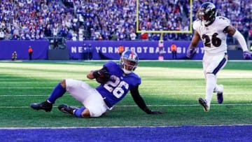 New York Giants running back Saquon Barkley (26) slides just short of the endzone late in the fourth quarter. The Giants defeat the Ravens, 24-20, at MetLife Stadium on Sunday, Oct. 16, 2022.
Nfl Ny Giants Vs Ravens