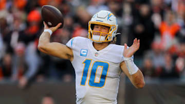 Dec 5, 2021; Cincinnati, Ohio, USA; Los Angeles Chargers quarterback Justin Herbert (10) throws a pass against the Cincinnati Bengals in the second half at Paul Brown Stadium. Mandatory Credit: Katie Stratman-USA TODAY Sports