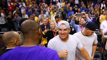 Mar 23, 2016; Phoenix, AZ, USA; Los Angeles Angels outfielder Mike Trout (right) greets Los Angeles Lakers guard Kobe Bryant following the game against the Phoenix Suns at Talking Stick Resort Arena. The Suns defeated the Lakers 119-107. Mandatory Credit: Mark J. Rebilas-USA TODAY Sports