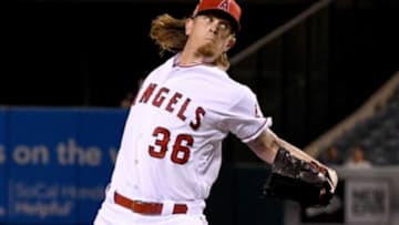 Sep 26, 2016; Anaheim, CA, USA; Los Angeles Angels starting pitcher Jered Weaver (36) throws the ball in the first inning of the game the Oakland Athletics at Angel Stadium of Anaheim. Mandatory Credit: Jayne Kamin-Oncea-USA TODAY Sports