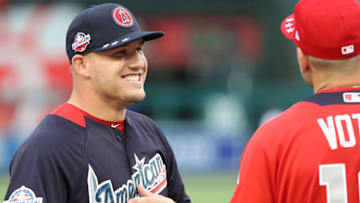 WASHINGTON, DC - JULY 16: Mike Trout #27 and Joey Votto #19 chat during Gatorade All-Star Workout Day at Nationals Park on July 16, 2018 in Washington, DC. (Photo by Rob Carr/Getty Images)
